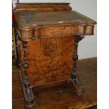 A mid-Victorian figured walnut and floral satinwood strung slopefront davenport, having a hinged