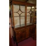 An Edwardian mahogany and chequer strung double door glazed display cabinet, having twin cupboard