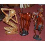 Three various contemporary African carved hardwood figure groups