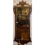 A circa 1900 mahogany Chippendale style fret-carved rectangular wall mirror, of good size, having