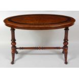 A Victorian figured walnut oval centre table, having inlaid ebonised banding and raised on spiral