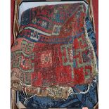 A Persian woollen red ground rug (worn); together with a blue coloured throw (2)