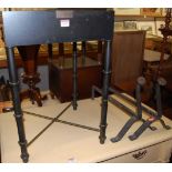 A black painted wood and iron single drawer low occasional table, w.40cm; together with a pair of