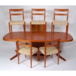 Svend Madsen - a 1960s Danish teak dining suite, comprising; extending dining table with rounded D-