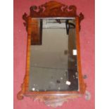 A 19th century mahogany fret carved rectangular wall mirror in the Chippendale taste, 81 x