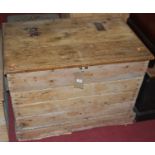 A rustic boarded and close nailed pine hinge topped blanket box, having rope end carry handles, w.