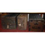 An early 20th century stained pine and metal bound hinge topped military travelling trunk, w.