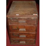 An early 20th century pitched pine four drawer table-top index filing chest, w.39cm