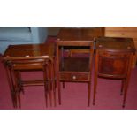 A reproduction mahogany and inlaid nest of three occasional tables; together with a 19th century