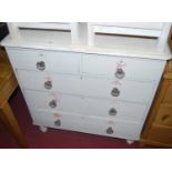 A Victorian white painted pine round cornered chest, of two short over three long drawers, raised on