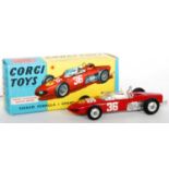 A Corgi Toys No, 154 Ferrari F1 Grand Prix race car comprising red body with spun hubs and racing