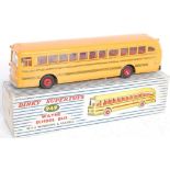 A Dinky Toys No. 949 Wayne school bus comprising of yellow body with red interior and red plastic