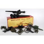 A collection of boxed and loose Britains and Triang military field guns and weapons to include a