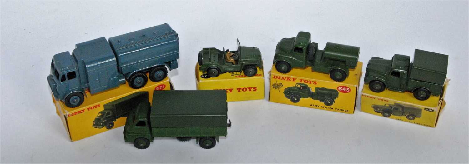 A collection of boxed and loose Dinky Toy Military diecasts to include No. 621 3 ton Army wagon, No.