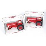 An Ertl 1:16 scale large diecast tractor group, comprising 2x Farmall 706 tractors, both housed in