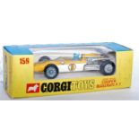 A Corgi Toys No. 159 Cooper Maserati F1 race car comprising of yellow and white body with blue