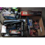 Three various boxes containing a quantity of mainly modern release Star Wars collectables, ephemera,