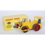 A French Dinky Toys No.90A Richier diesel compressor road roller, comprising of yellow body with red