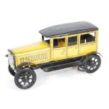 A Wells o' London early 20th century tinplate and clockwork model of a Limousine, model No.W0815,