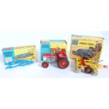 A Corgi Toys boxed tractor and farm implement diecast group to include No. 66 Massey Ferguson 165