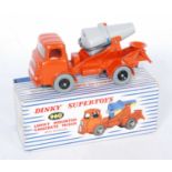 A Dinky Toys No.960 lorry mounted concrete mixer, comprising of orange body with black hubs and