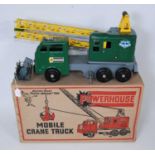 A Marx Toys No.2734 tinplate and pressed steel model of a mobile crane truck, comprising dark green,