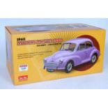 A Sunstar 1/12 scale box limited edition model of a 1960 Morris Minor 1000 saloon (one millionth),