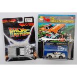 A collection of TV related carded diecast and electronic vehicles to include a TCR slot racing