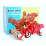 A Corgi Toys No. 1111 Massey Ferguson 780 combine comprising of bright red body with yellow cast