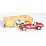 A Solido No. 102 Maserati 250 race car comprising of red body with silver exhaust and spun hubs,