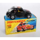 A Matchbox Superfast No. 31 Volksdragon comprising black body with yellow interior, Beetle