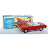 A Corgi Toys No. 246 Chrysler Imperial Saloon, comprising of red body with light blue interior and