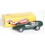 A Solido No. 104 Vanwall F1 racing car comprising green body with silver exhaust, driver figure, and