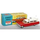 A Corgi Toys No. 437 Superior Ambulance comprising red and cream body with brown interior and spun