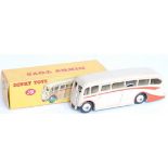 A Dinky Toys No. 281 Luxury coach comprising of cream and orange body with cream hubs, housed in the
