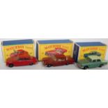 A collection of boxed Matchbox Regular Wheels diecasts, three examples, all with some minor