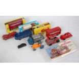 A collection of various boxed loose and bagged diecast vehicles and plastic kits to include an