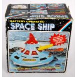 A Star Toys of Hong Kong plastic and battery operated model of a spaceship comprising multi coloured