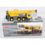 A Conrad 1:50 scale No.2092/01 model of a Grove GMK3050 all-terrain hydraulic crane, comprising