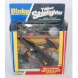 A Dinky Toys No.362 Trident Star Fighter, housed in the original window box with missiles (box