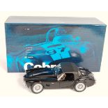 An Exoto Racing Legends, model No. RLG18132 model of a Shelby Cobra 289 soft top, limited edition