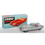 A Corgi Toys No. 151 Lotus Mk11 Le Mans race car, comprising silver body with red interior, spun