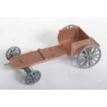 An original Moko Lesney Products Soap Box Racer, finished in bronze, with base metal spoked