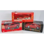 A Bburago and Polistil 1/18 scale window boxed racing car diecast group, three examples to include a