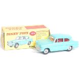 A Dinky Toys No. 155 Ford Anglia Saloon comprising turquoise body, red interior and spun hubs,