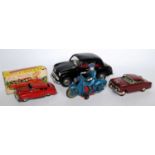 A collection of various boxed and loose plastic and tinplate vehicles to include a Victory