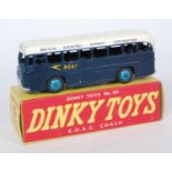 A Dinky Toys No.283 BOAC Coach, comprising of dark blue body with white roof and light blue hubs,