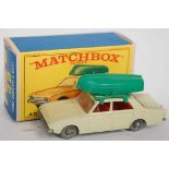 A Matchbox Regular Wheels No. 45B Ford Corsair and boat, comprising of pale yellow body with red