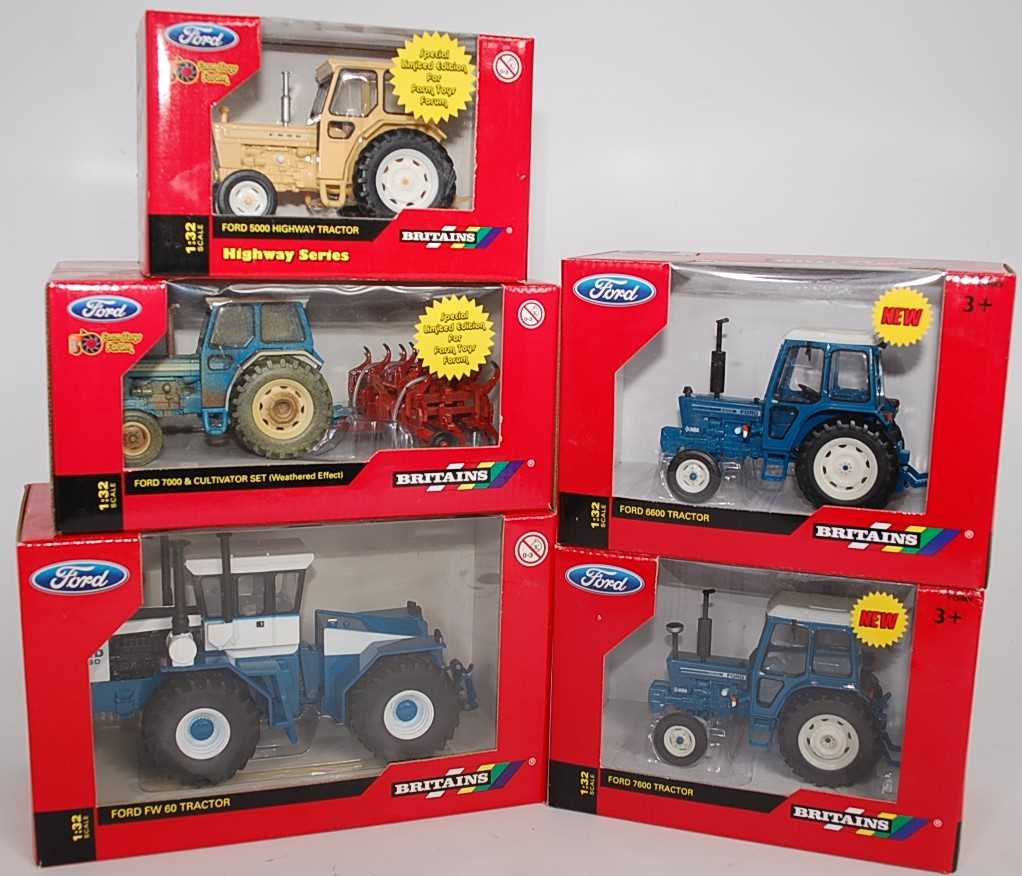 A Britains 1/32 scale boxed diecast Ford tractor group, five examples, all appear as issued, to