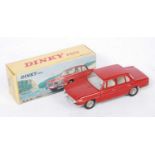 A French Dinky Toys No.534 BMW 1500, comprising red body with off-white interior and spun hubs,